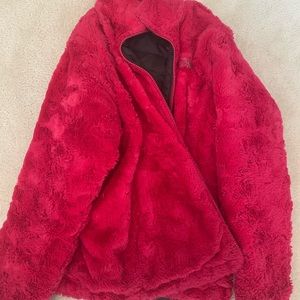 pink fluffy reversible north face coat